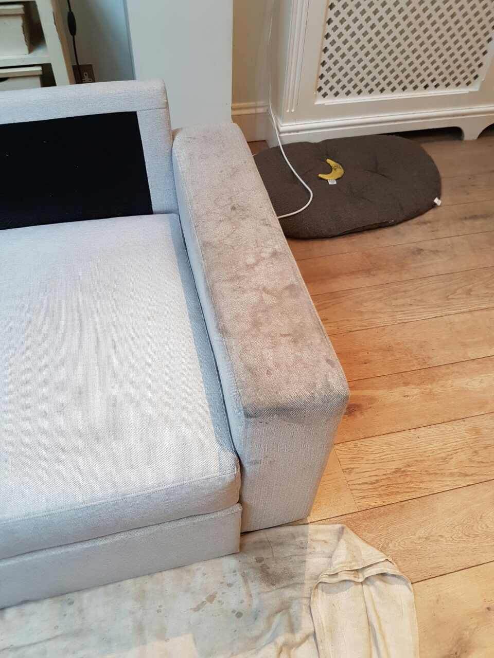 photo illustration of a cleaner cleaning a rug with a vacuum cleaner